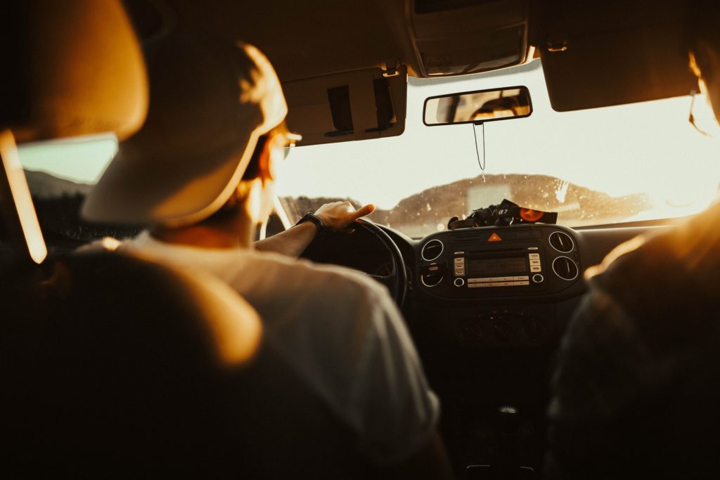 Driving Car on Sunny Day