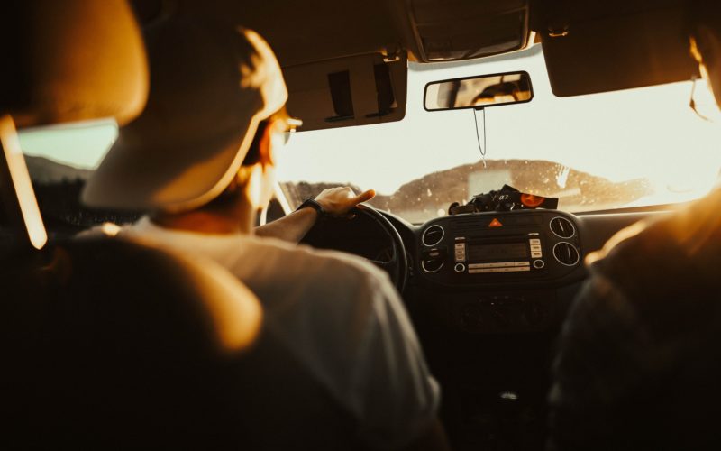 Driving Car on Sunny Day