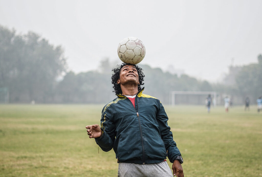 Person playing soccer