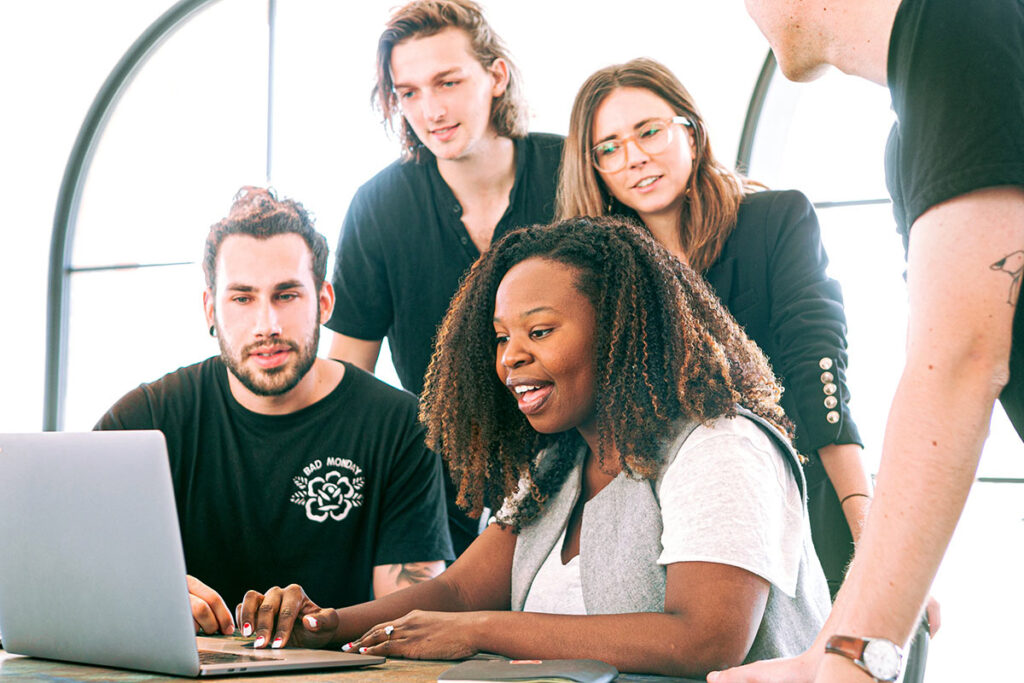 Group of College Students in front of Computer