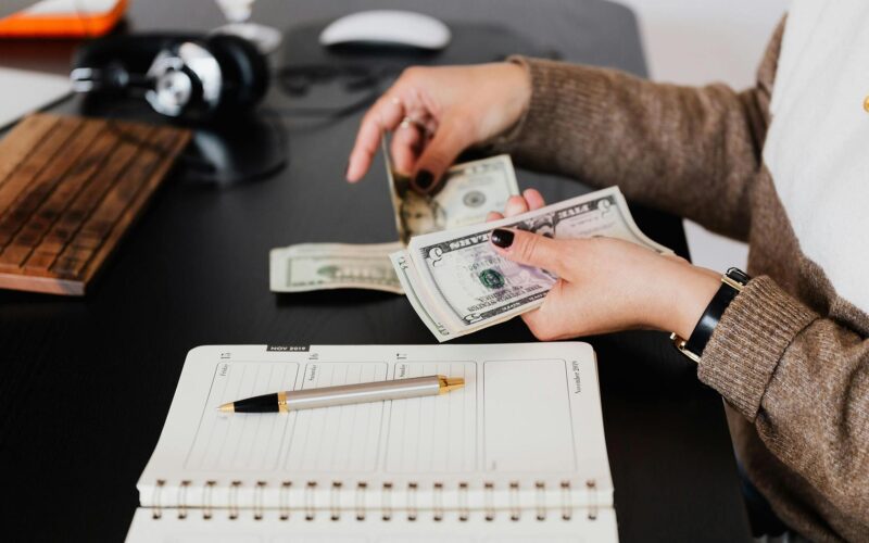 Closeup of Someone Person Counting Cash
